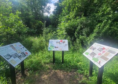 Newly installed interpretive signs explain the history of the Silverbrook site.